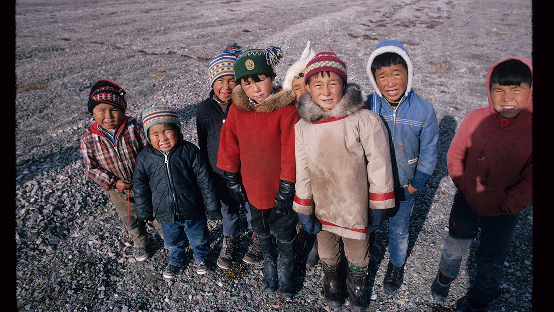 Inuit children standing outside