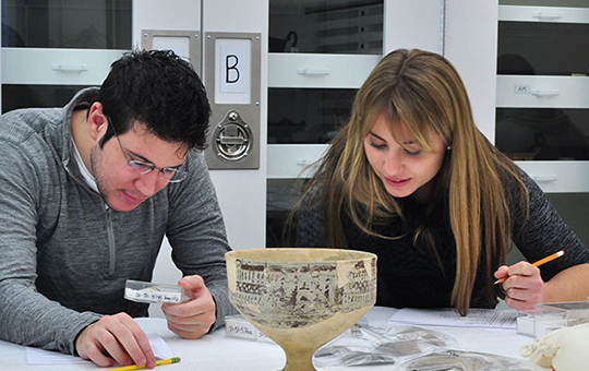 Students in a collections study room.